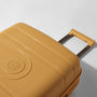 ECO-Tough 21" Hardside Carry-On 8 Wheel Expandable Spinner (Honey Gold)