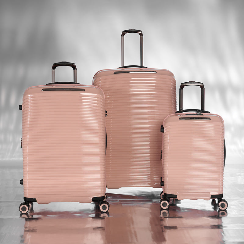 Traversed 21" Hardside Carry-On 8 Wheel Expandable Spinner (Metallic Rose Gold)