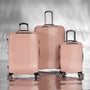 Traversed 21" Hardside Carry-On 8 Wheel Expandable Spinner (Metallic Rose Gold)